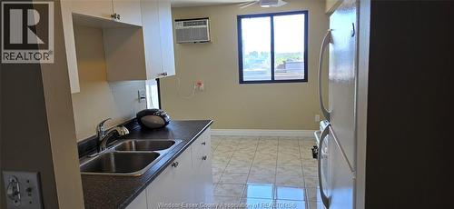 150 Park West Unit# 1112, Windsor, ON - Indoor Photo Showing Kitchen With Double Sink