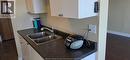 150 Park West Unit# 1112, Windsor, ON  - Indoor Photo Showing Kitchen With Double Sink 