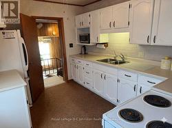 Cabinets painted white using AI - 