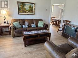 Walls painted white & new flooring using AI - 