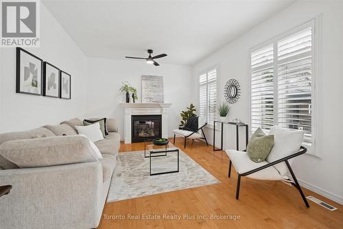 14 Mossgrove Drive, Kitchener, ON - Indoor Photo Showing Living Room With Fireplace