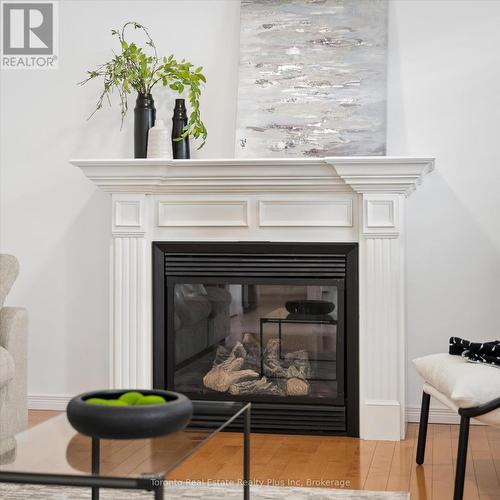14 Mossgrove Drive, Kitchener, ON - Indoor Photo Showing Living Room With Fireplace