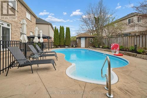 14 Mossgrove Drive, Kitchener, ON - Outdoor With In Ground Pool
