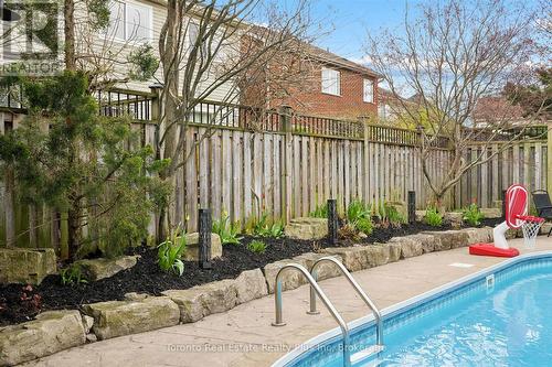 14 Mossgrove Drive, Kitchener, ON - Outdoor With In Ground Pool