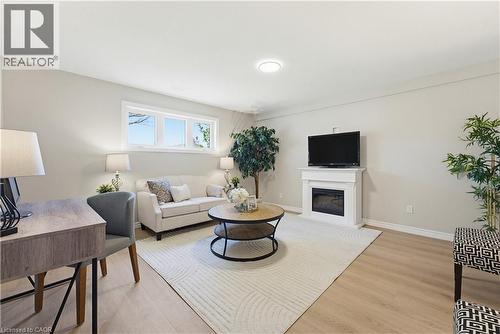 99 Oakhurst Crescent, Kitchener, ON - Indoor Photo Showing Living Room With Fireplace