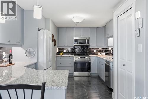 436 623 Saskatchewan Crescent W, Saskatoon, SK - Indoor Photo Showing Kitchen With Upgraded Kitchen