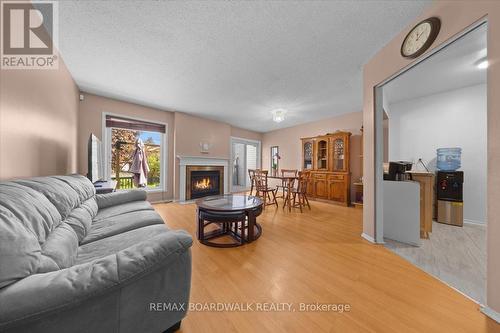 1516 Briarfield Crescent, Ottawa, ON - Indoor Photo Showing Living Room With Fireplace