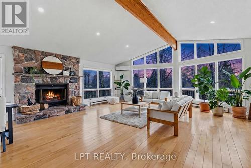 Welcome Home To 50 Concession Road 2 W! - 50 Concession Rd 2 W, Tiny, ON - Indoor Photo Showing Living Room With Fireplace