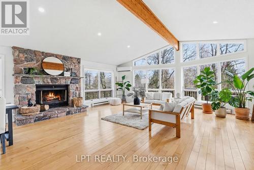 50 Concession Rd 2 W, Tiny, ON - Indoor Photo Showing Living Room With Fireplace