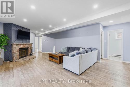 Rec Space - 50 Concession Rd 2 W, Tiny, ON - Indoor Photo Showing Living Room With Fireplace