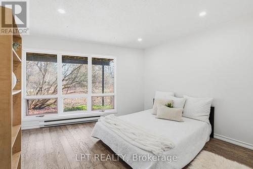 50 Concession Rd 2 W, Tiny, ON - Indoor Photo Showing Living Room With Fireplace