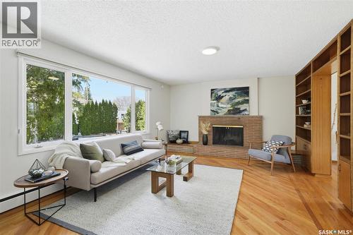 2020 Eastlake Avenue, Saskatoon, SK - Indoor Photo Showing Living Room With Fireplace