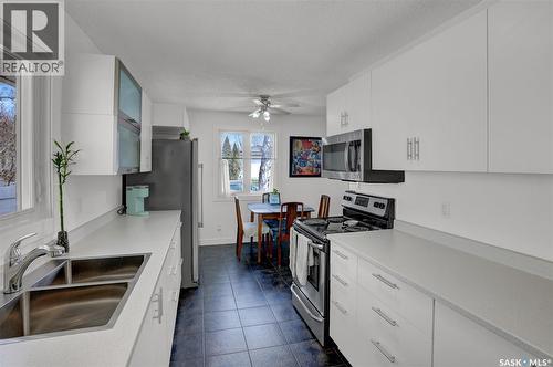 23 Scrivener Crescent, Regina, SK - Indoor Photo Showing Kitchen With Double Sink