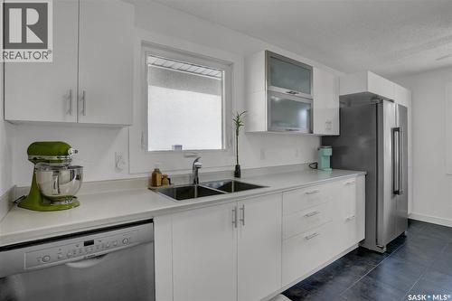 23 Scrivener Crescent, Regina, SK - Indoor Photo Showing Kitchen With Double Sink