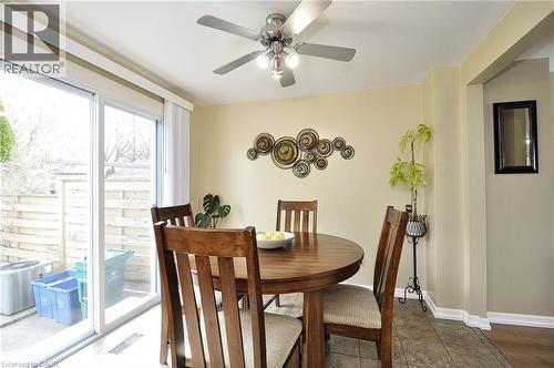 Dining area with tile flooring and neutral wall tones - 114 Bakersfield Drive, Cambridge, ON - Indoor Photo Showing Dining Room