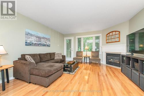 111 Steele Park Private, Ottawa, ON - Indoor Photo Showing Living Room With Fireplace