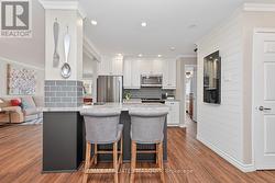 centre island, stainless steel appliances - 
