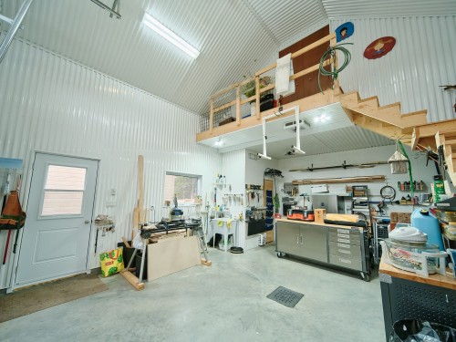 Garage - 653 2E Rang, Saint-Charles-De-Bourget, QC - Indoor Photo Showing Garage