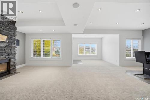 258 Whalley Crescent, Saskatoon, SK - Indoor Photo Showing Living Room With Fireplace