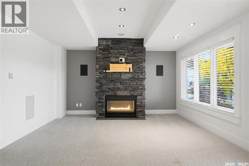 258 Whalley Crescent, Saskatoon, SK - Indoor Photo Showing Living Room With Fireplace
