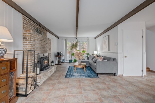 Salon - 1421 Rue Des Pierrots, Sainte-Adèle, QC - Indoor With Fireplace