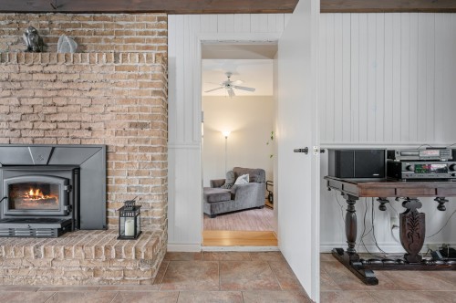 Salon - 1421 Rue Des Pierrots, Sainte-Adèle, QC - Indoor With Fireplace