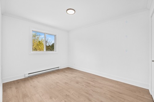 Bedroom - A-19 Rue Jubinville, Laval (Pont-Viau), QC - Indoor Photo Showing Other Room