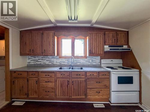 225 1St Avenue W, Frontier, SK - Indoor Photo Showing Kitchen With Double Sink