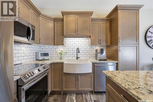 49 115 Veltkamp Crescent, Saskatoon, SK - Indoor Photo Showing Kitchen With Upgraded Kitchen