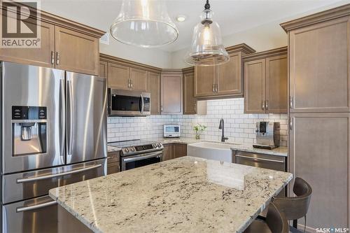 49 115 Veltkamp Crescent, Saskatoon, SK - Indoor Photo Showing Kitchen With Upgraded Kitchen