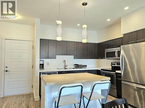 985 Academy Way Unit# 310, Kelowna, BC - Indoor Photo Showing Kitchen With Upgraded Kitchen