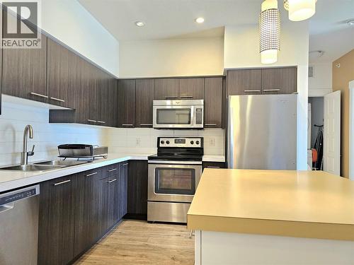 985 Academy Way Unit# 310, Kelowna, BC - Indoor Photo Showing Kitchen With Double Sink With Upgraded Kitchen