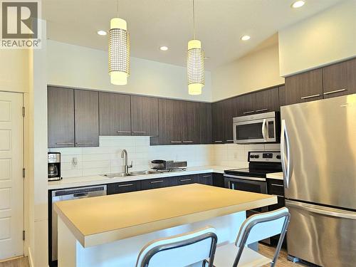 985 Academy Way Unit# 310, Kelowna, BC - Indoor Photo Showing Kitchen With Upgraded Kitchen