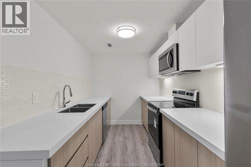 3320 Stella Unit# 611, Windsor, ON - Indoor Photo Showing Kitchen With Double Sink With Upgraded Kitchen
