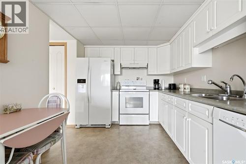 236 2530 25Th Avenue, Regina, SK - Indoor Photo Showing Kitchen With Double Sink