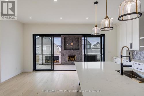 8 Edgeview Crescent W, Middlesex Centre, ON - Indoor Photo Showing Other Room With Fireplace
