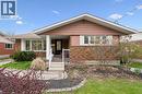 Brick and siding exterior featuring a covered porch entry - 111 Ruskview Road, Kitchener, ON  - Outdoor 