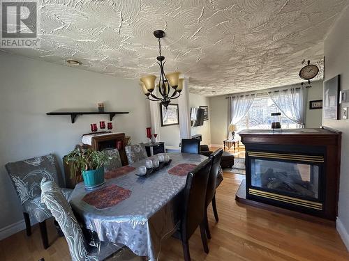 58 Forest Road, Milltown, NL - Indoor Photo Showing Dining Room With Fireplace