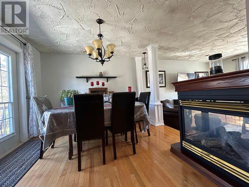 58 Forest Road, Milltown, NL - Indoor Photo Showing Dining Room With Fireplace