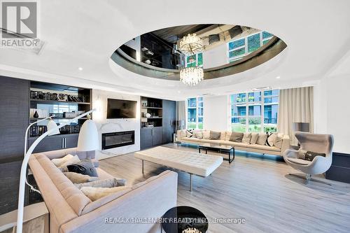 409 - 10 Concord Place, Grimsby, ON - Indoor With Fireplace