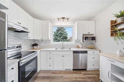 187 Dollard Boulevard, Winnipeg, MB - Indoor Photo Showing Kitchen With Stainless Steel Kitchen With Double Sink