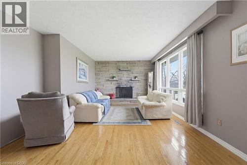 516 Mud Street E, Hamilton, ON - Indoor Photo Showing Living Room With Fireplace