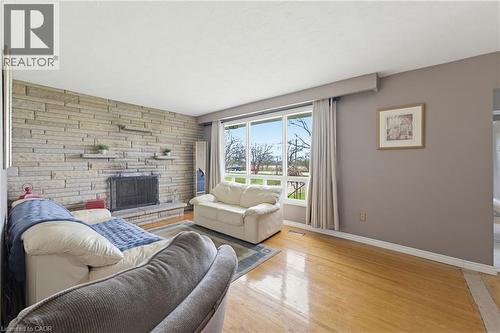 516 Mud Street E, Hamilton, ON - Indoor Photo Showing Living Room With Fireplace