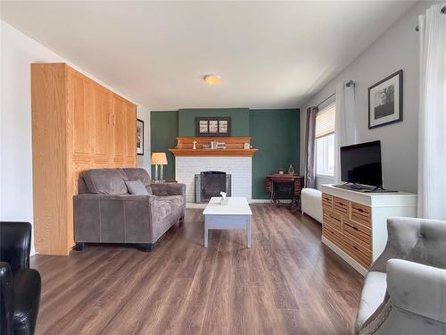 141 Main Street, Rivers, MB - Indoor Photo Showing Living Room With Fireplace