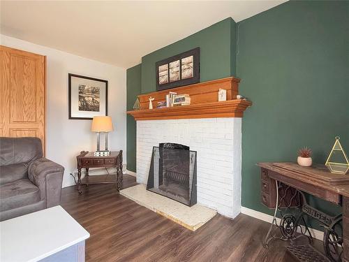 141 Main Street, Rivers, MB - Indoor Photo Showing Living Room With Fireplace