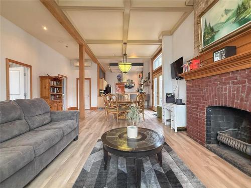 141 Main Street, Rivers, MB - Indoor Photo Showing Living Room With Fireplace