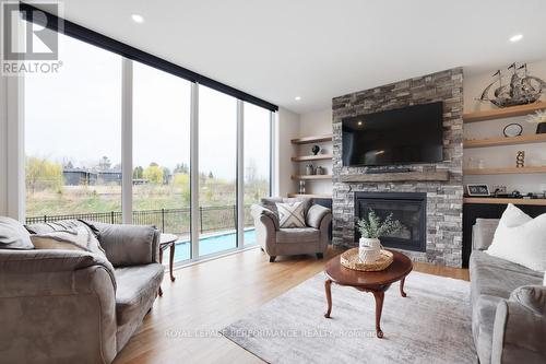 Living room with fireplace - 541 Barrage Street, Casselman, ON - Indoor Photo Showing Living Room With Fireplace