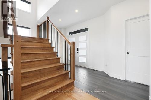 Foyer with custom staircase - 541 Barrage Street, Casselman, ON - Indoor Photo Showing Other Room