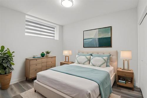 virtually staged bsmt suite - 624 Magnan Street, Winnipeg, MB - Indoor Photo Showing Bedroom
