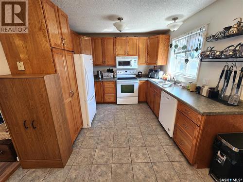 1330 8Th Street, Estevan, SK - Indoor Photo Showing Kitchen With Double Sink